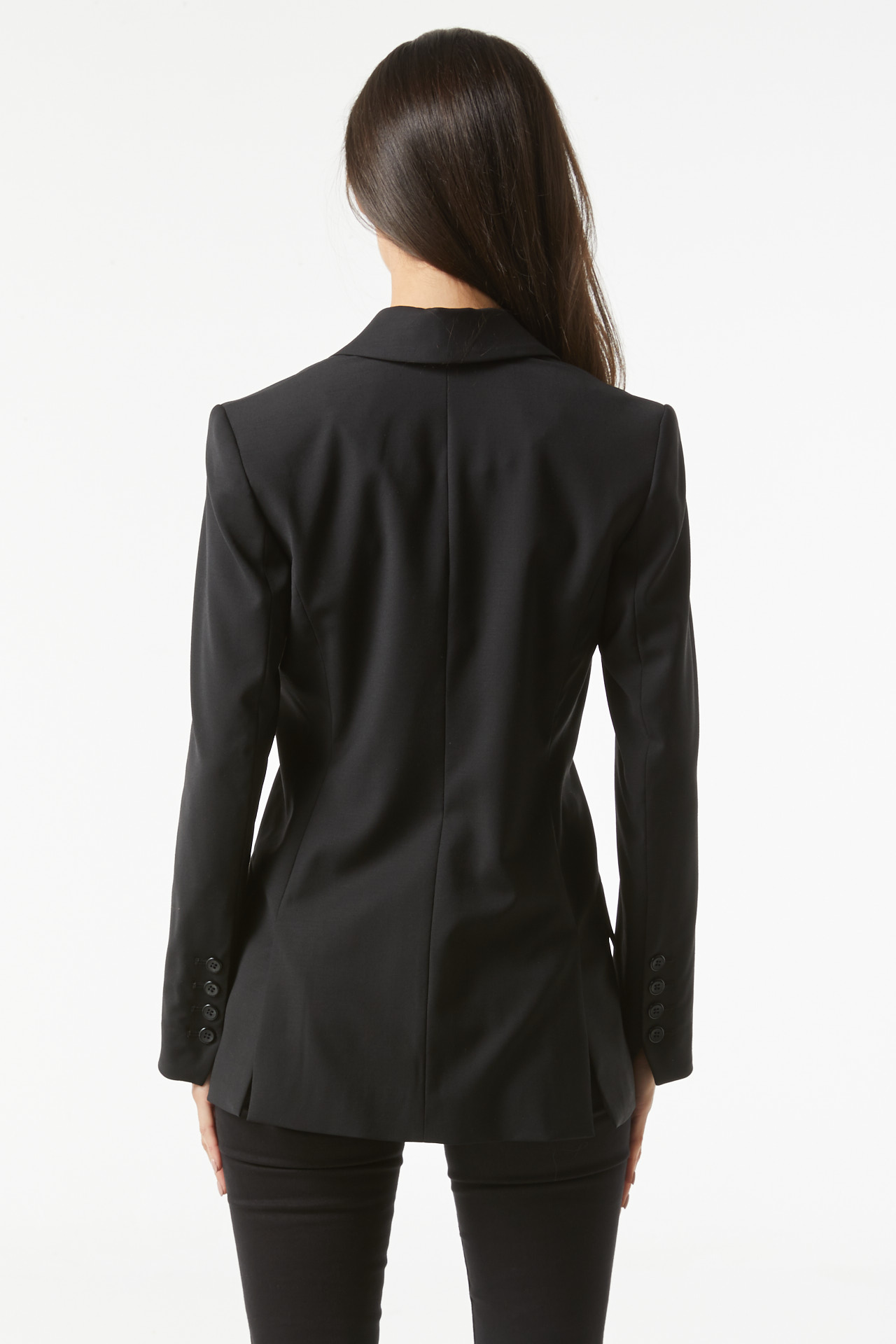 Back of model wearing Odena black blazer
